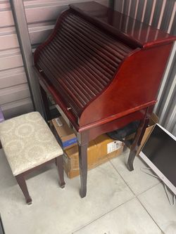 Dresser with storage and roll top
