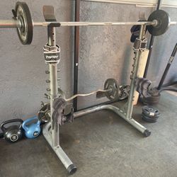 Weider XRS 20 Olympic Squat Rack with Adjustable Safety Spotters and Bar Holds