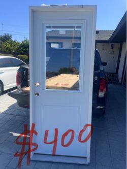 Puerta nueva de exterior de steel con persianas por en medio size 32x80