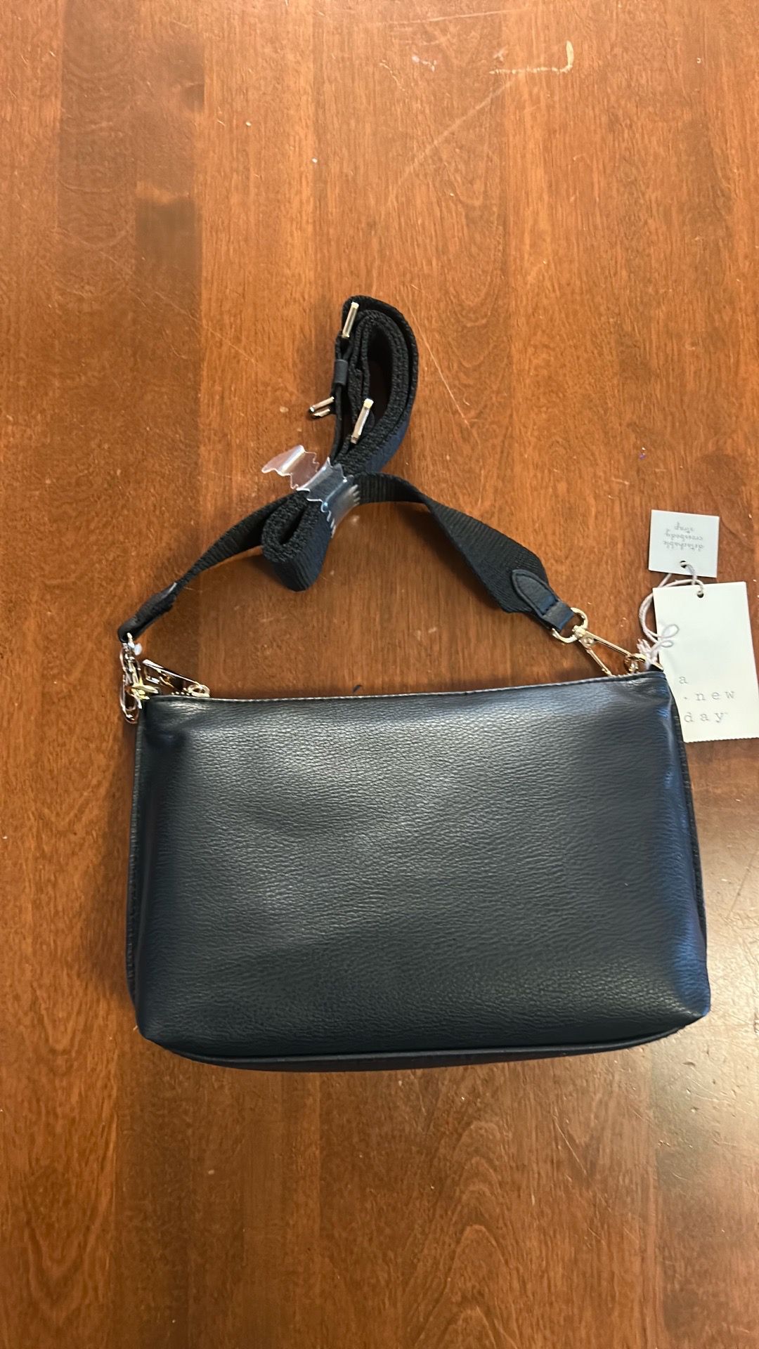 black pleather material. brand new out of box pocketbook