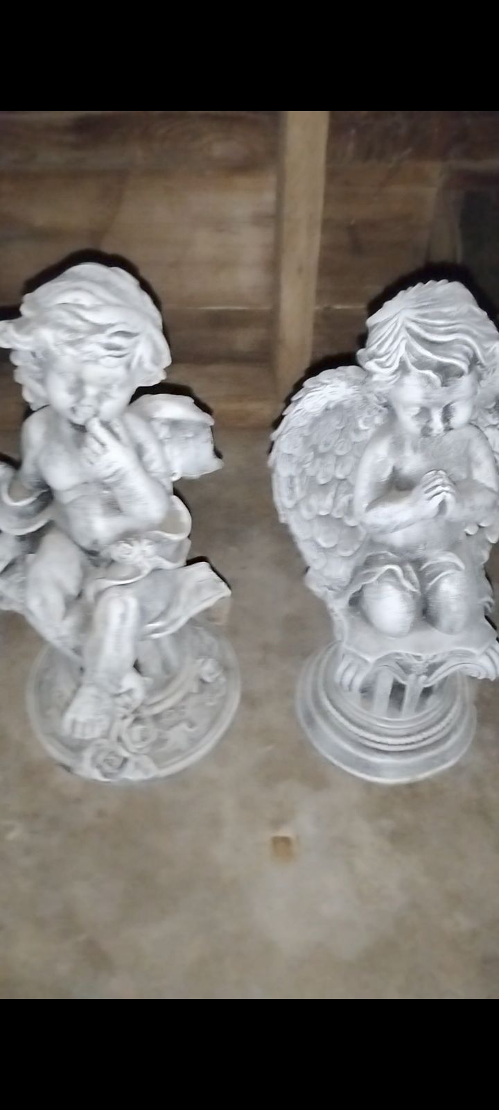 2 angel statues. NEW