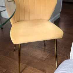Four Velvet Chairs In Yellow Color
