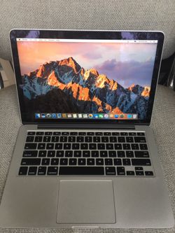 MacBook Pro 2015 model 13 inch ( practically new)