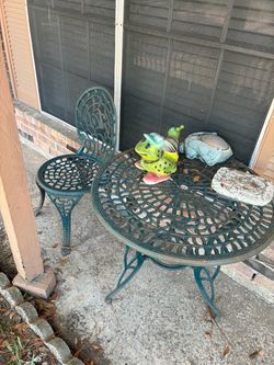 Cast patio table and chair