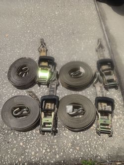 4 33ft long  by 2inch wide straps for equipment on trailer. In good working condition. Selling for $25
