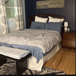 Bedframe, boxspring, and nightstand