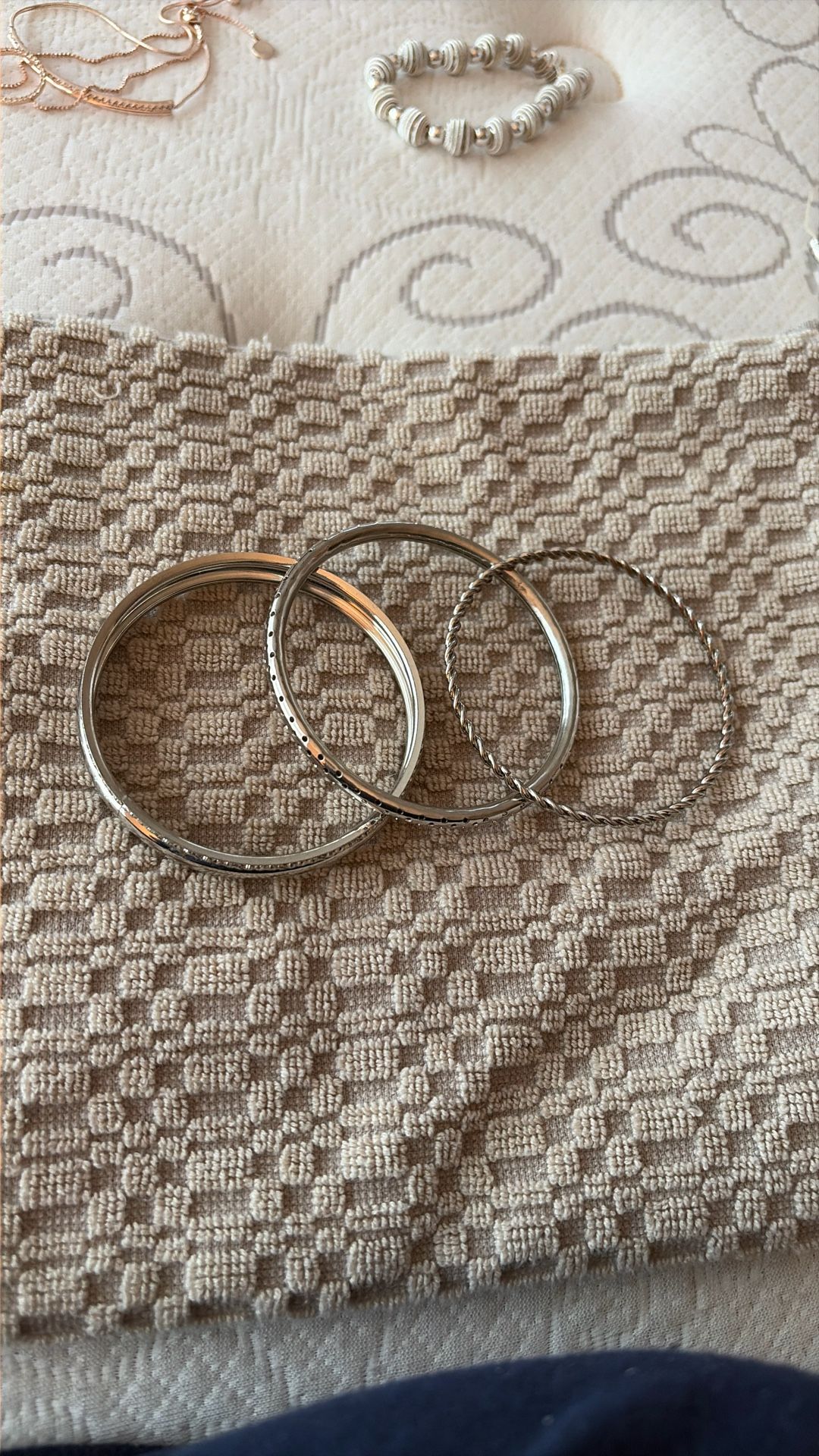 Three Bangle Silver Tone Bracelets