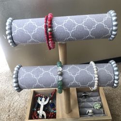 Jewelry organizer with compartments for necklaces, bracelets, and other jewelry