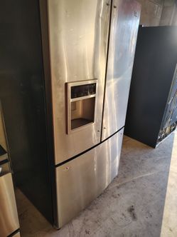 3 door lg  stainless refrigerator works good except icemaker stop working  only 200.00