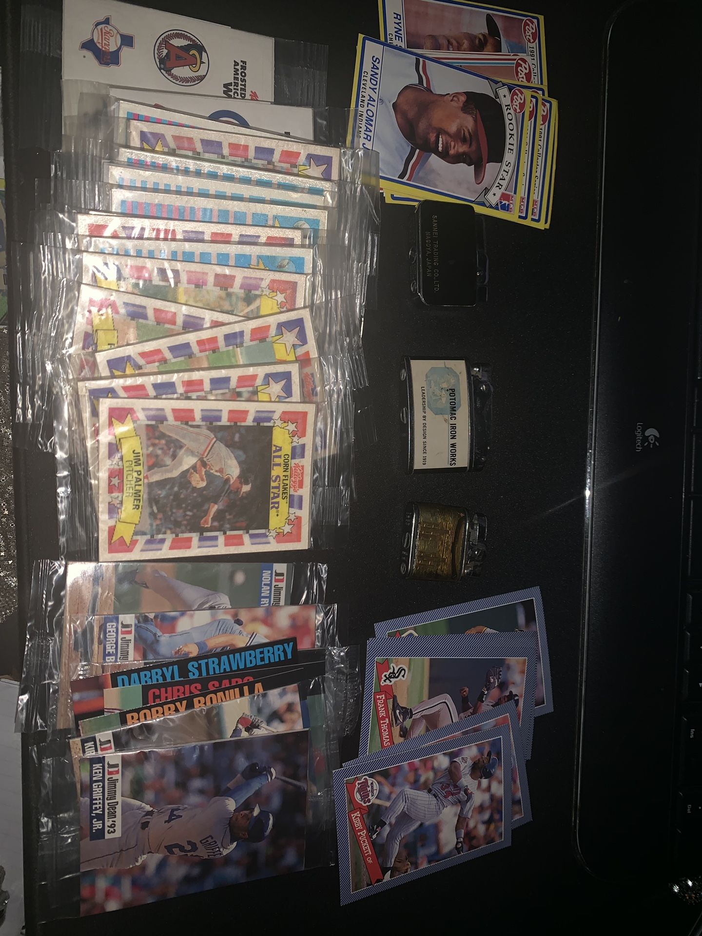 Old baseball cards and 3 old lighters