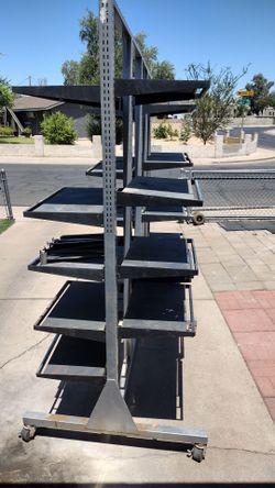 Heavy duty industrial metal storage  Rack.  Adjustable shelves  size. 99" inches Wide X 86"inches Tall  X 33" inches deep.   $. 390.