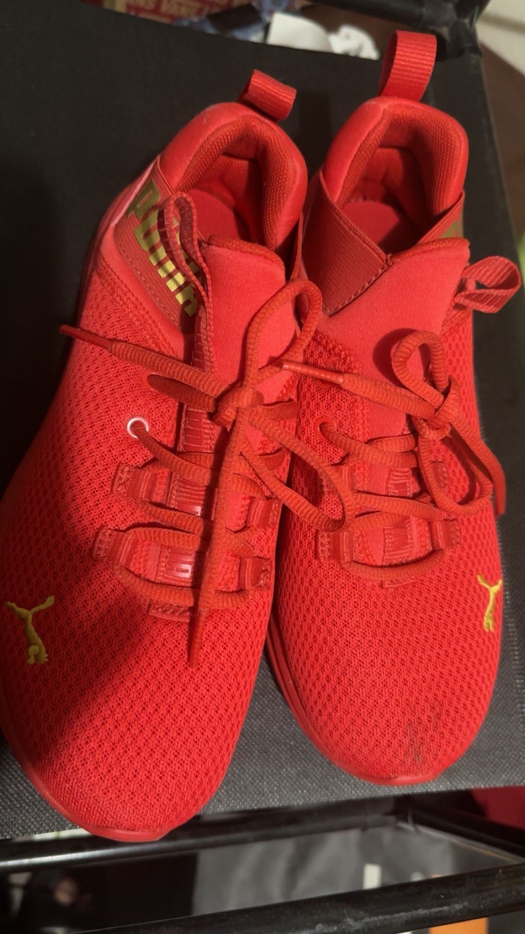 Red puma shoes