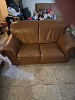 Brown Leather sofa-Cheers