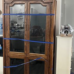 Two Solid Walnut Lighted Curio Cabinets