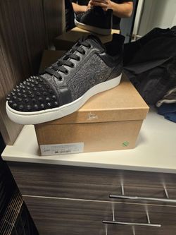 Men's size 42 Lou Boutins sneakers.