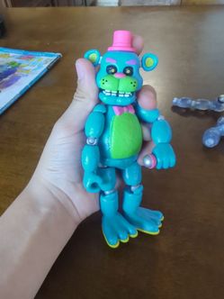 Blacklight Freddy action figure