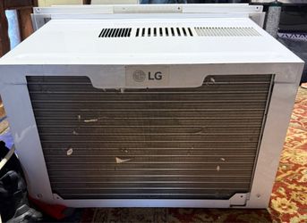 LG 10,000 BTU digital AC window unit + Window kit