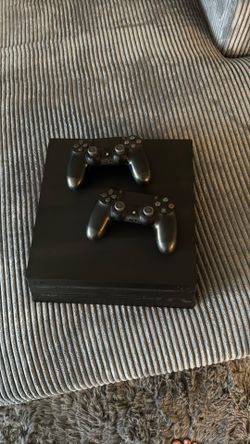 PS4 Pro With Carrying Case, 2 Controllers, 3 Games, And Headphones