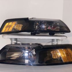 LA Zona Auto Parts 99 to 04 Ford Mustang Headlights Luces Micas Calaveras Faros