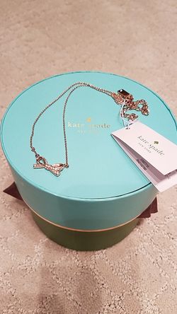 Kate Spade bow tie necklace in rose gold