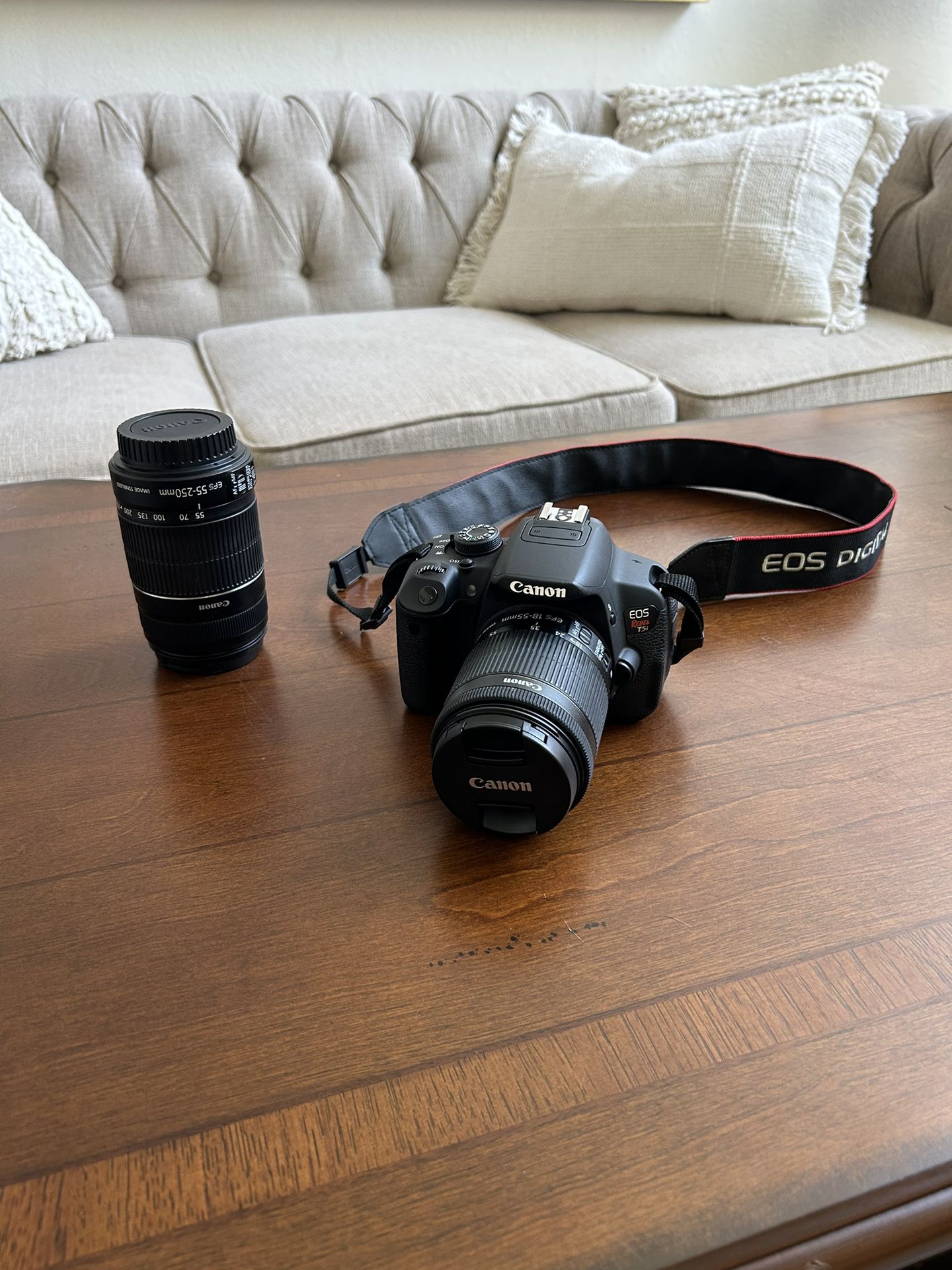 CanonĀ EOS Rebel T5i DSLR Camera with 18-135mm Lens. Also comes with extra 55-250mm lens and case