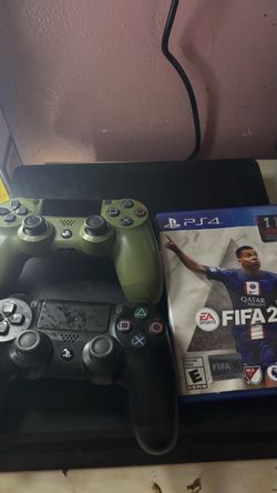 PS4 Console with 2 Controllers and FIFA Game