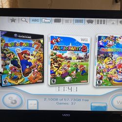 NINTENDO WII with 33 WII and GAMECUBE GAMES and 2500 OLD SCHOOL GAMES