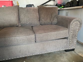 Gray Couch. About ten feet long.