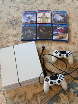 White PS4 Console Bundle with 2 Controllers and 6 Games