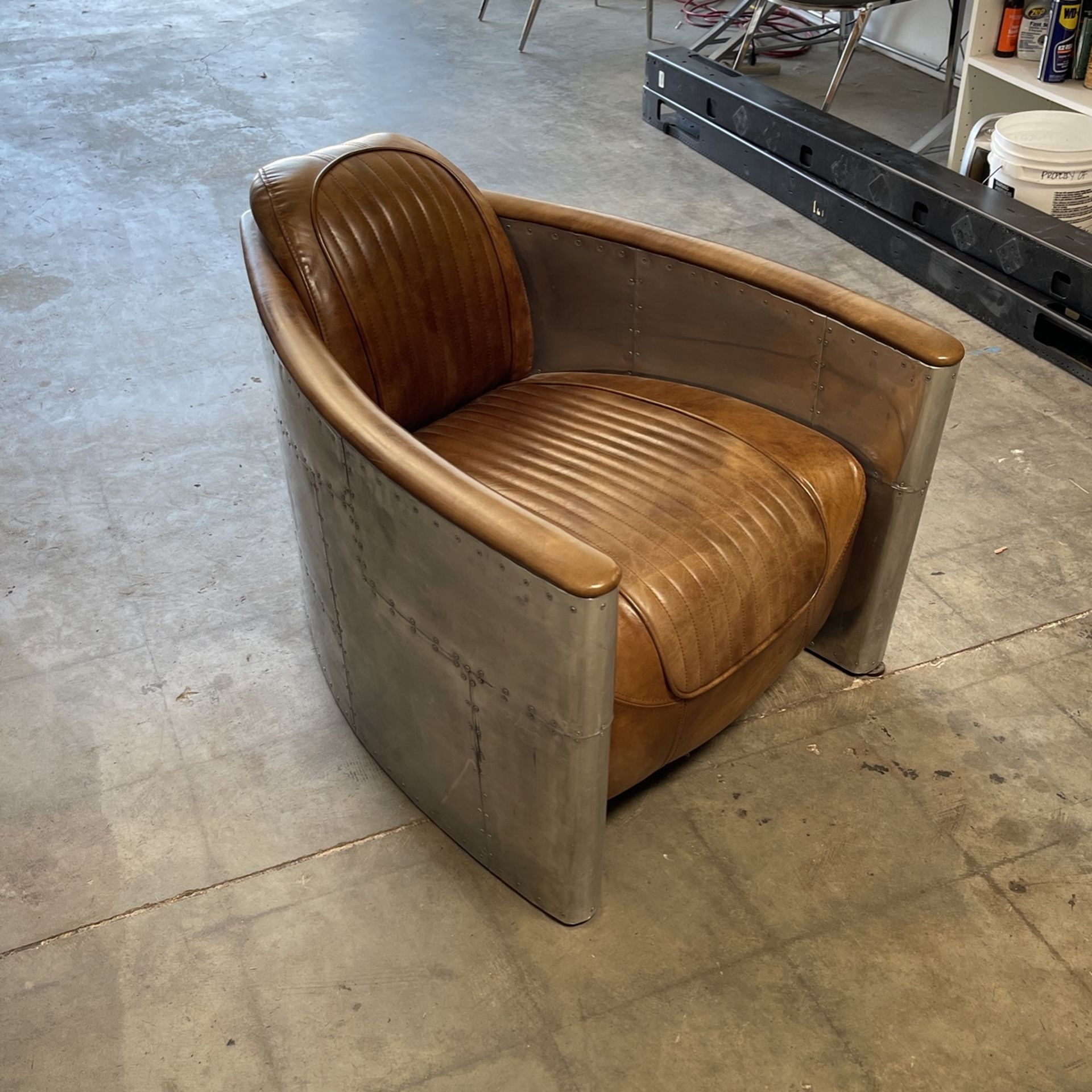 Repurposed Materials Aviation Style Leather Chair