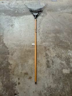 Metal rake with wooden handle brand new