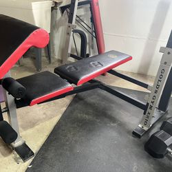 Gold’s Gym bench and leg combo 