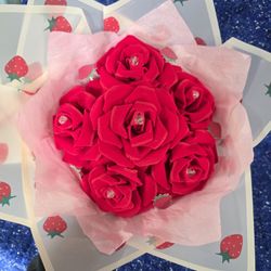 bouquet of artificial red roses,