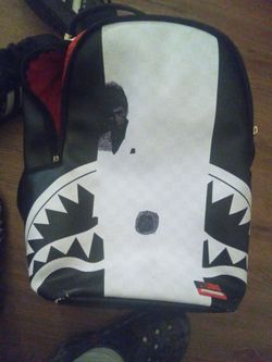 Sprayground used a Lil but in good shape