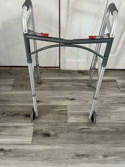 Folding walker with wheels
