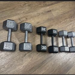 3 Pairs Of Hex Cast Iron Dumbbells   35s, 30s, 25s  Total: 180 lbs  In New Condition see the pics. 30s original paint; 25s and 35s Reconditioned Great