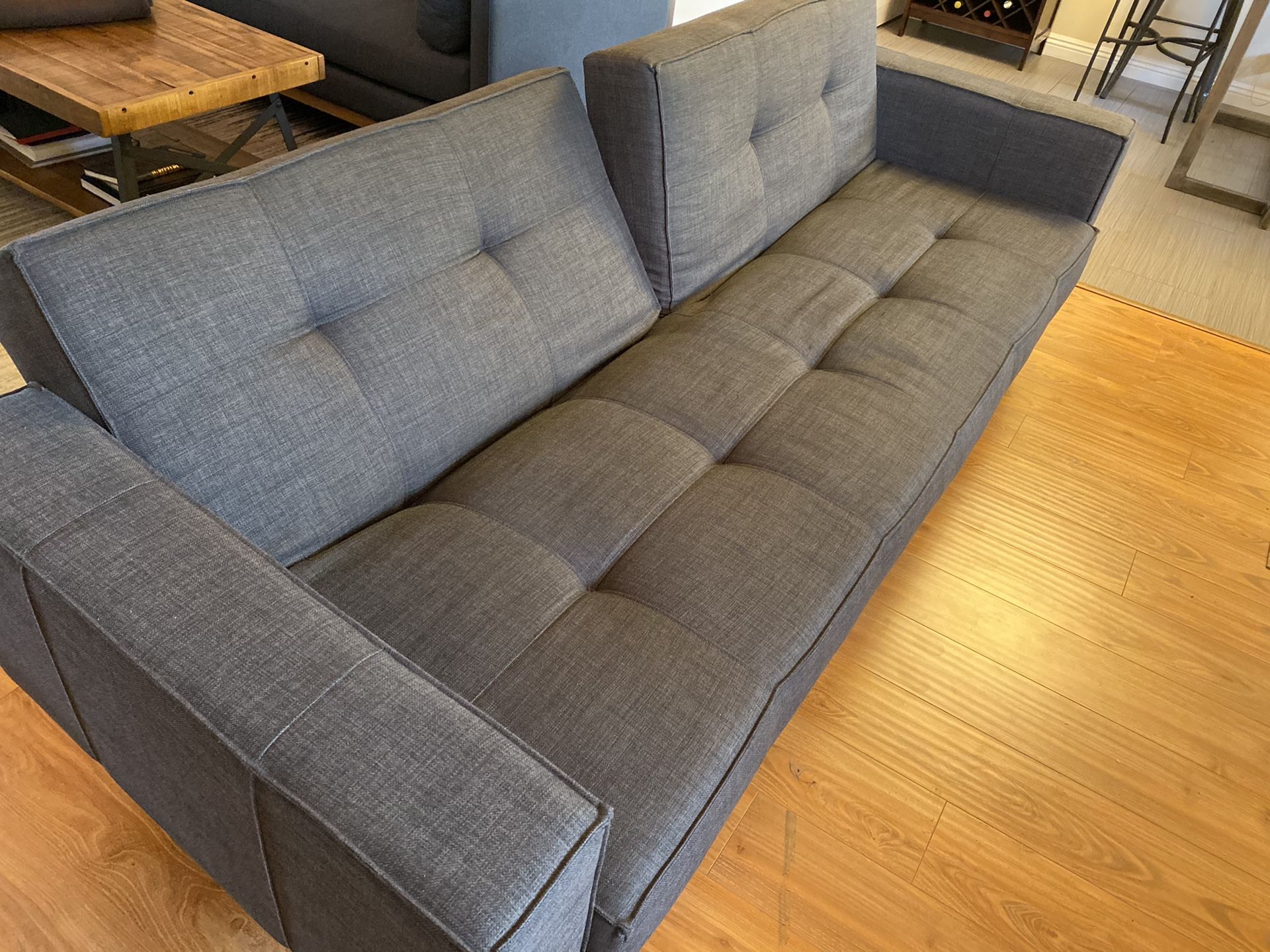 Long Sofa / Couch with adjustable back to Sleeper Bed