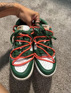 Nike Dunk Low Off-White green, white, and orange sneakers.