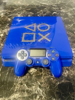 PlayStation 4 Slim "Days of play" 1TB + SCUF Controller