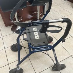 Four Wheeled Walker With Seat
