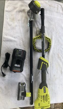 Brushless trimmer with 4ah battery and charger