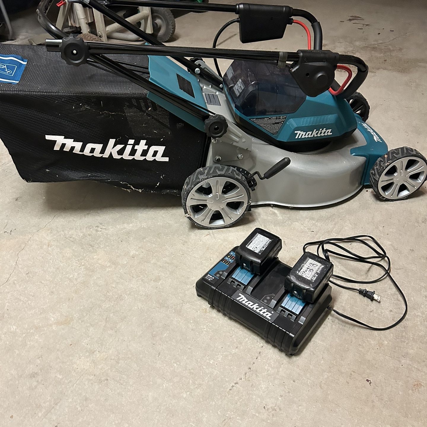 Makita Cordless Lawn Mower With Charger And  2 18volt Batteries 2 