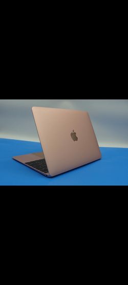 MacBook 12 inch rose gold in super good condition 8gb ram 250gb hardrive with charger