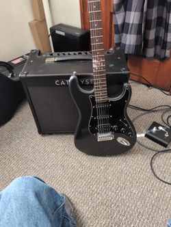 Catalyst 60 Watt Amplifier And A Squire Infiniti Deluxe Strat