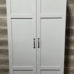 Brand new pantry cabinet, assembly required. Size: 30”W x 70”H x 16”D.