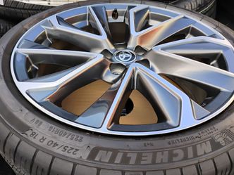 Toyota Corolla SE factory rims with Michelin tires.