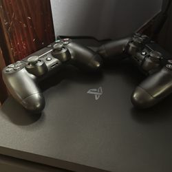 PS4 500GB with 2 controllers And 2 Games