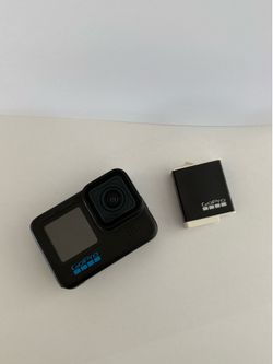 GoPro Hero 11 with extra battery.