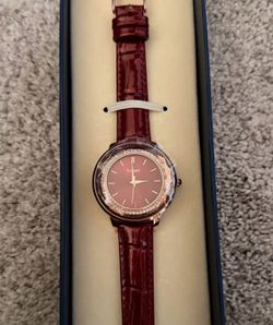Brand new ladies Stauer wrist watch in Merlot.