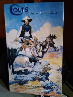 Colt's revolver tin sign